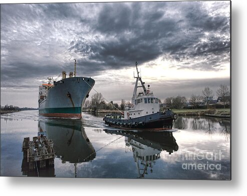 Tugboat Metal Print featuring the photograph Tugboat Pulling a Cargo Ship by Olivier Le Queinec