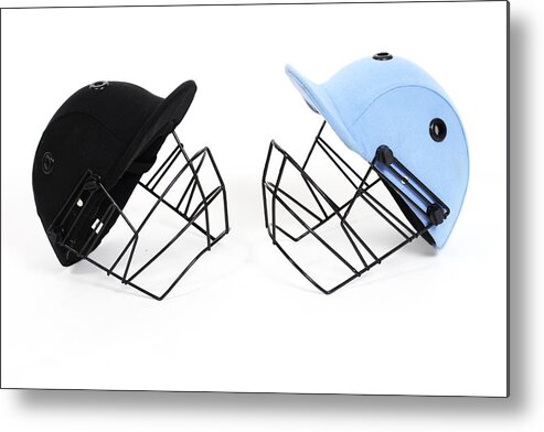 Crash Helmet Metal Print featuring the photograph Two Cricket Helmets Facing Each Other by Visage