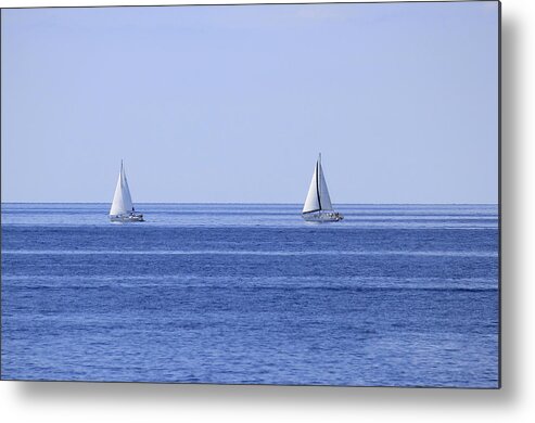Boat Metal Print featuring the photograph Two sailboats on open sea horizon by Brch Photography