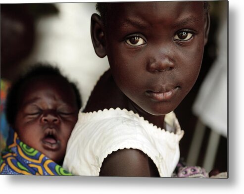 Human Metal Print featuring the photograph Ugandan Girl Carrying A Baby by Mauro Fermariello/science Photo Library