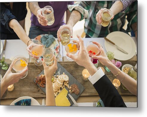 People Metal Print featuring the photograph USA, New Jersey, Jersey City, People toasting at party by Jamie Grill