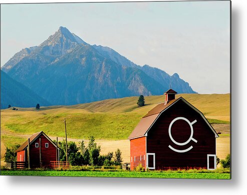 Agricultural Metal Print featuring the photograph Wallowa Mountains And Red Barn In Field by Nik Wheeler