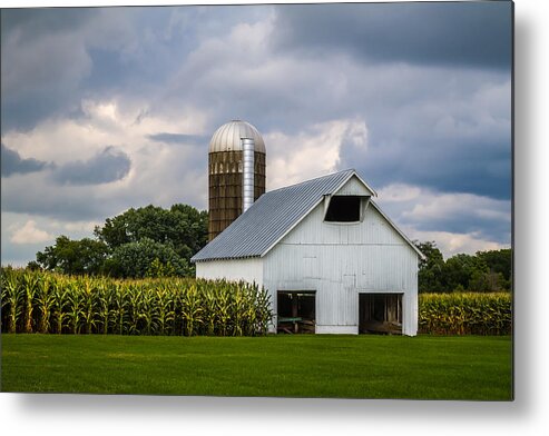 Art Metal Print featuring the photograph White Barn and Silo with Storm Clouds by Ron Pate