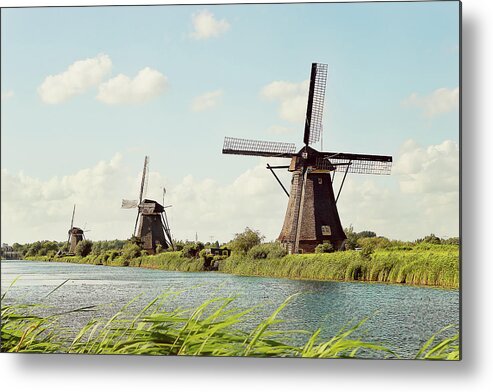 Tranquility Metal Print featuring the photograph Windmills by Itziar Aio