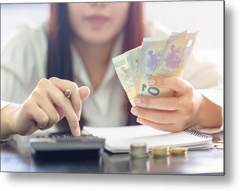 Coin Metal Print featuring the photograph Woman counting money Euro banknotes, Business or stock market concept image. by Pakin Songmor