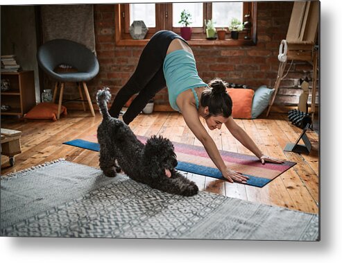 Pets Metal Print featuring the photograph Woman doing yoga with her dog by Hobo_018