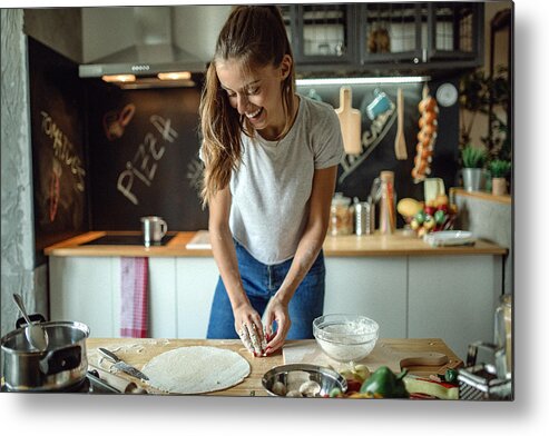 Three Quarter Length Metal Print featuring the photograph Woman preparing dought for pizza by CreativeDJ