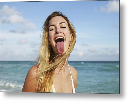 Caucasian Ethnicity Metal Print featuring the photograph Woman Sticking Out Tongue by Dimitri Otis