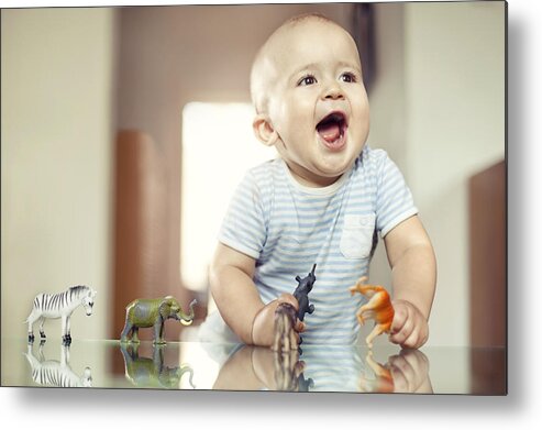 People Metal Print featuring the photograph Young boy playing with toy animals by Orbon Alija