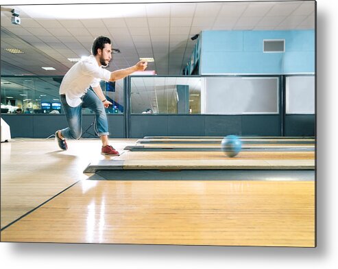 Young Men Metal Print featuring the photograph Young Man Bowling by RoBeDeRo