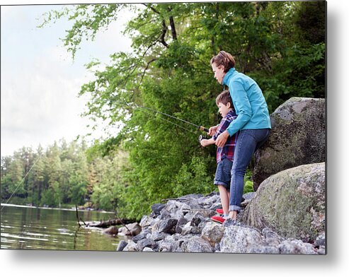 6-7 Years Metal Print featuring the photograph Young Mother Helping Son Fish At Kezar by Monica Donovan