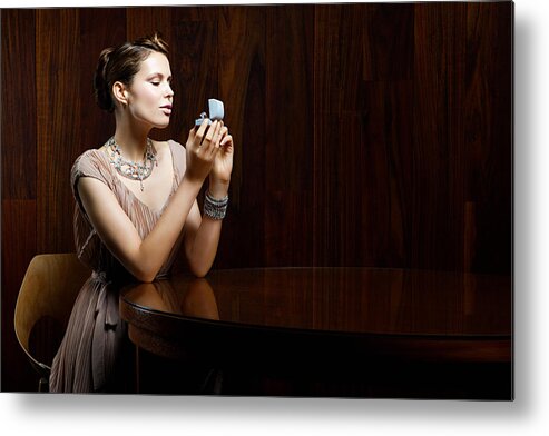 People Metal Print featuring the photograph Young woman looking at engagement ring in box by Image Source