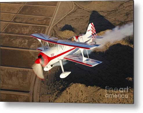 Transportation Metal Print featuring the photograph A Pitts Model 12 Aircraft In Flight by Scott Germain