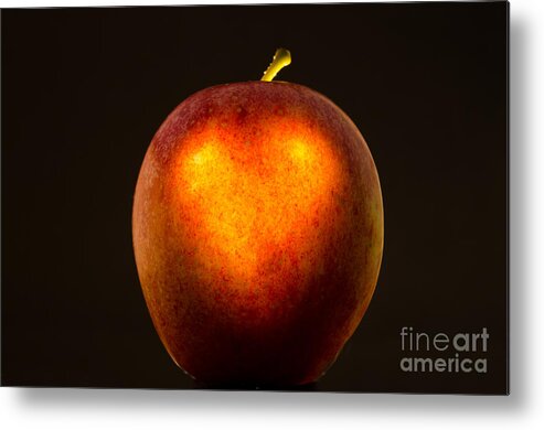 Apple Metal Print featuring the photograph Apple with a illuminated heart by Mats Silvan