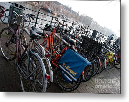 Along The River Metal Print featuring the digital art Bikes in Amsterdam by Carol Ailles