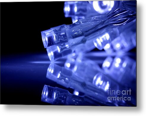 Abstract Metal Print featuring the photograph Blue LED lights closeup with reflection by Simon Bratt