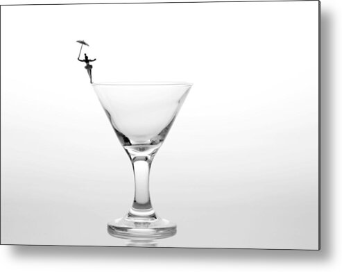 Black Metal Print featuring the photograph Circus balance game on cup edge by Paul Ge