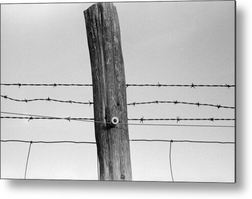 History Metal Print featuring the photograph Electrified Barbed Wire Fence. As by Everett