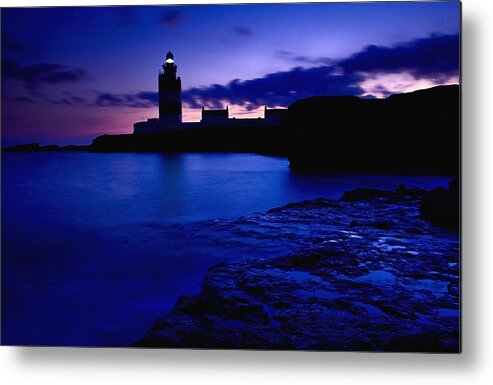 Beacon Metal Print featuring the photograph Lighthouse Beacon At Night by Gareth McCormack