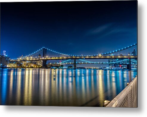 Downtown Metal Print featuring the photograph Manhattan Bridge and light reflections in East River. by Val Black Russian Tourchin