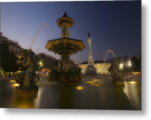 Rossio Square Fountain Metal Print featuring the photograph One of the fountains in Rossio Square at dusk by Sven Brogren