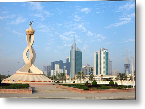 Oryx; Roundabout; Monument; Qatar; Qatar; Arabia; Commercial; District; Traffic Circle; High Rise; Construction; Architecture; Postmodern; Landscape Metal Print featuring the photograph Oryx Roundabout in Qatar by Paul Cowan