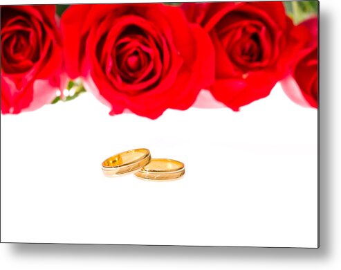 Backgrounds Metal Print featuring the photograph Red roses and wedding rings over white by U Schade