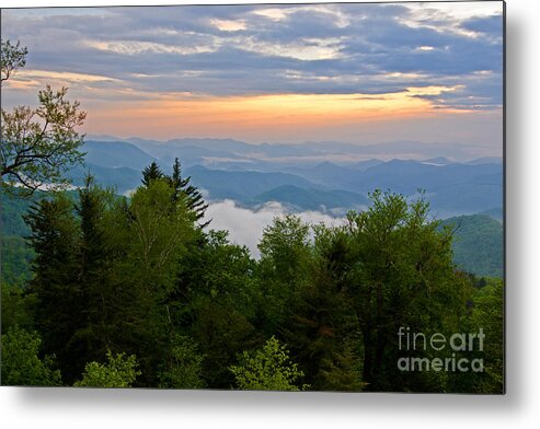 Sunset Metal Print featuring the photograph Stormy Sunset by Bob and Nancy Kendrick