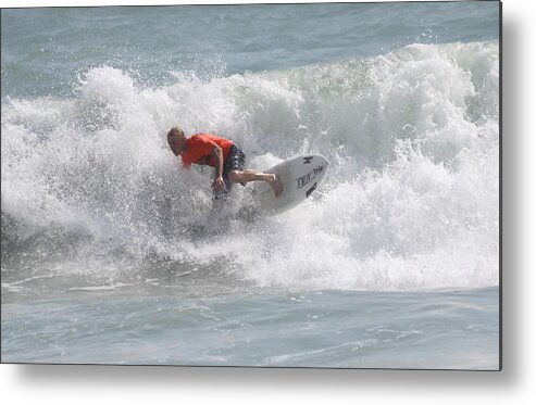Surfing Metal Print featuring the photograph Surfing in Cocoa Beach by Jeanne Andrews
