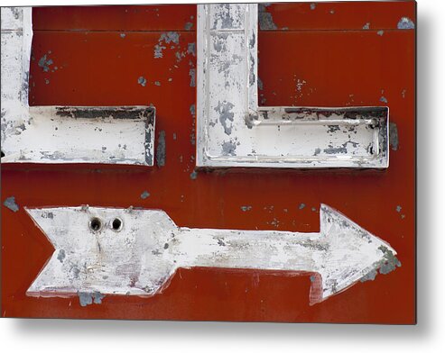 Route 66 Metal Print featuring the photograph White Arrow on Motel Sign by Carol Leigh
