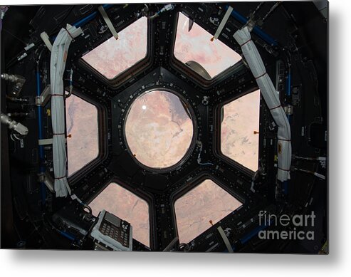 Iss Metal Print featuring the photograph Window Of International Space Station by NASA/Science Source