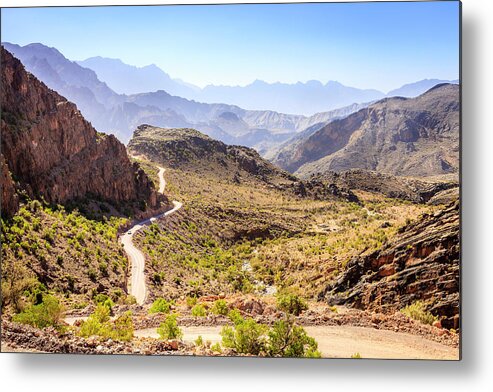 Al Hajar Metal Print featuring the photograph Mountain road in Oman #1 by Alexey Stiop