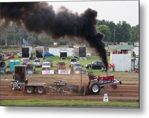 Rebel Outlaw Pulling Tractor Metal Print featuring the photograph Rebel Outlaw #1 by Holden The Moment