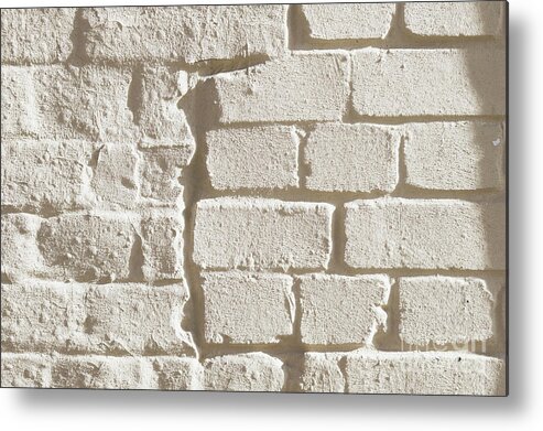 Abstract Metal Print featuring the photograph Weathered brick wall #3 by Tom Gowanlock