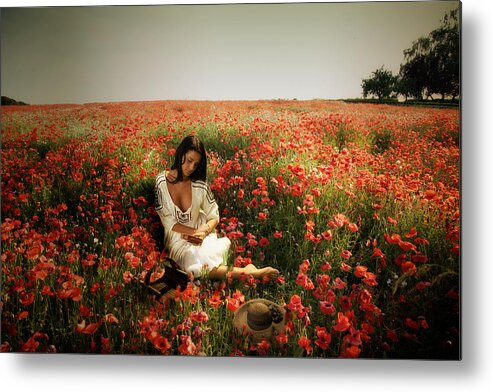 Portrait. Poppies Metal Print featuring the photograph A girl reading amongst he Poppies by Mark Egerton