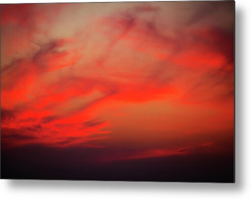 Adventure Metal Print featuring the photograph a gorgeous sunset with luminous red clouds over the Yala Nationalpark by Gina Koch