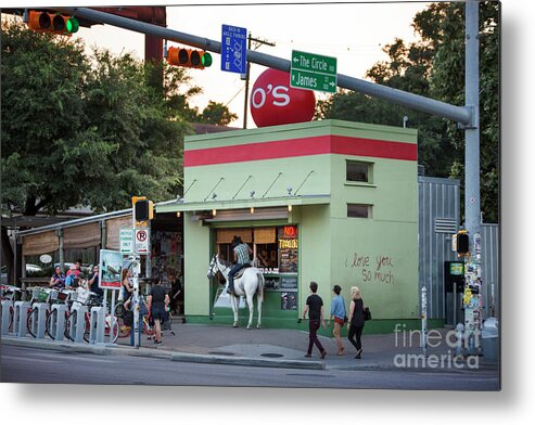 Man Metal Print featuring the photograph A man on horseback stops at a South Congress coffee stand for a cappuccino by Dan Herron