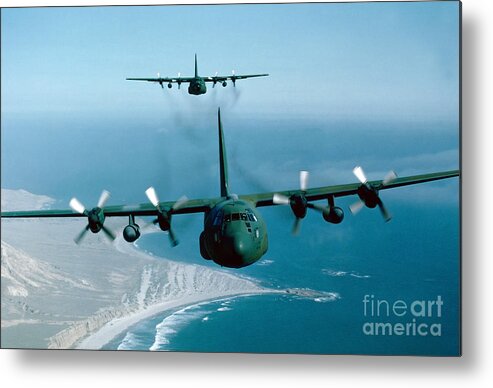 Horizontal Metal Print featuring the photograph A Pair Of C-130 Hercules In Flight by Stocktrek Images
