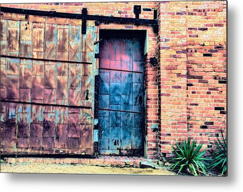 Diana Mary Sharpton Photography Metal Print featuring the photograph A Rusty Loading Dock Door by Diana Mary Sharpton