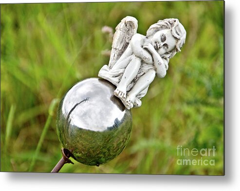 Photograph Metal Print featuring the photograph Angel on her Silver Ball by Adriana Zoon