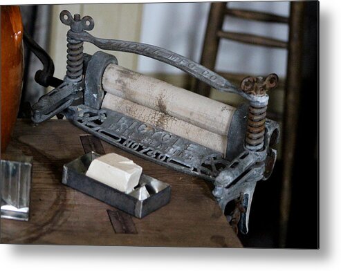 Laundry Room Metal Print featuring the photograph Antique Laundry Ringer and Handmade Lye Soap Photograph by Colleen Cornelius