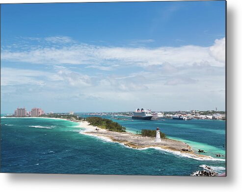 Architecture Metal Print featuring the photograph Bahamas Lighthouse with Nassau and Resort in Background by Darryl Brooks