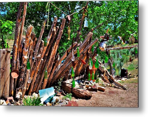 Fence Metal Print featuring the photograph Bottle fence in Golden New Mexico by Dwight Eddington