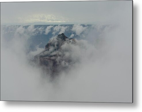 Grand Canyon Metal Print featuring the photograph Brahma Temple in a sea of clouds by Gaelyn Olmsted