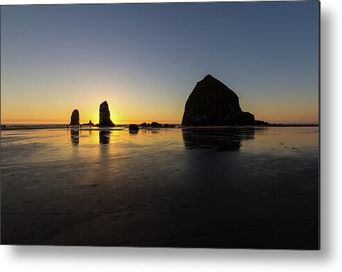 Cannon Metal Print featuring the photograph Cannon Beach Low Tide Sunset by David Gn