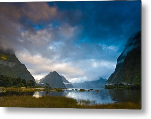 Background Metal Print featuring the photograph Cloudy morning at milford sound at sunrise by U Schade