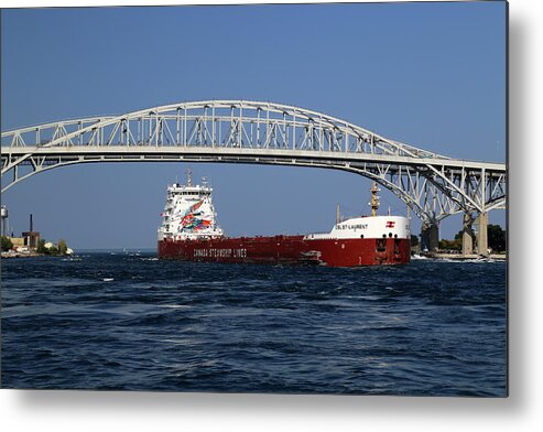 Csl St Laurent Metal Print featuring the photograph CSL St-Laurent and Blue Water Bridge by Mary Bedy