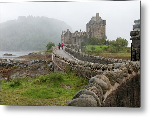Castles Metal Print featuring the photograph Eilean Donan Castle in the Highlands of Scotland by Michalakis Ppalis