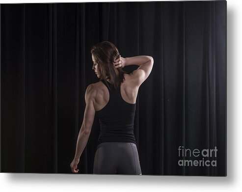 Model Metal Print featuring the photograph Emily showing her back muscles by Dan Friend