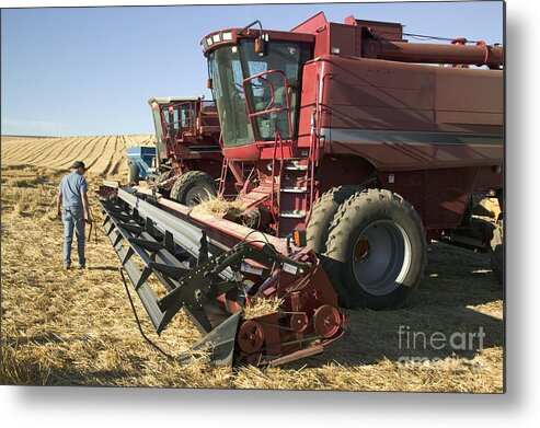 Farmer Metal Print featuring the photograph Farmer Inspects His Combine by Inga Spence